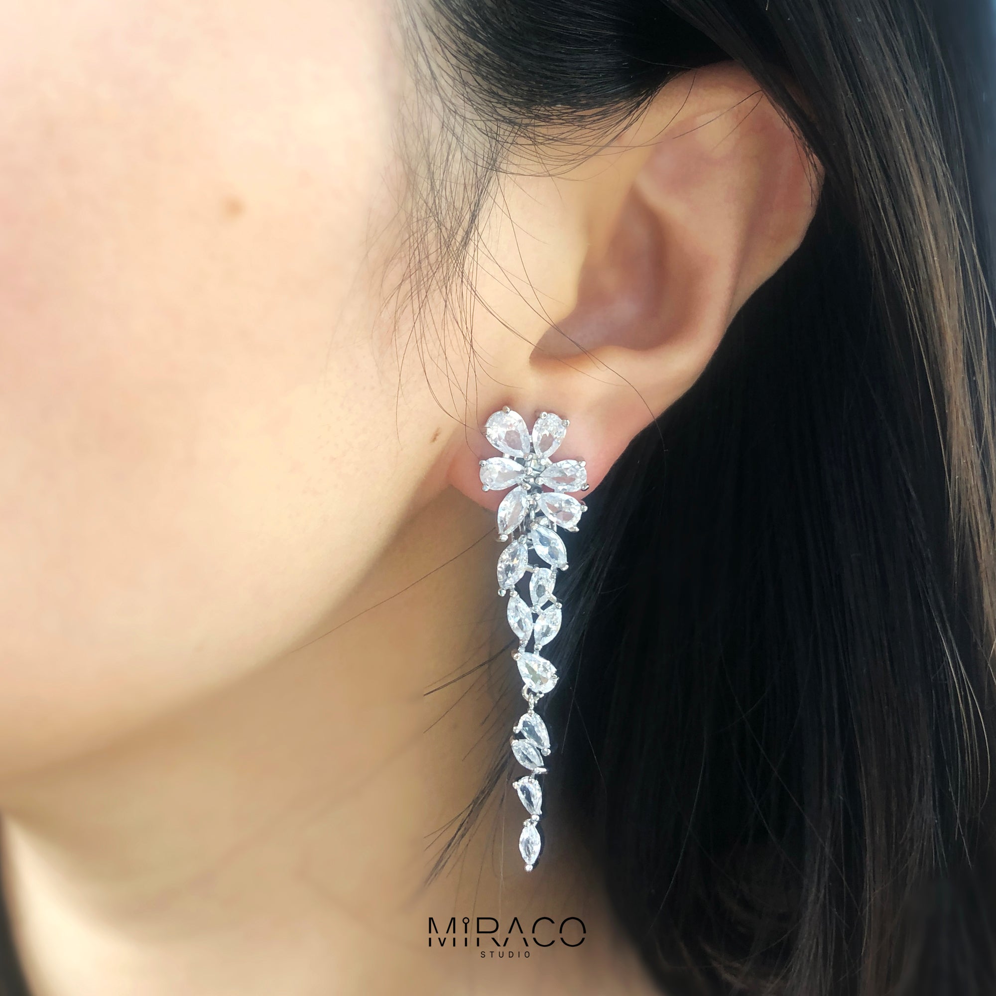 Glass and crystal leaf drop store earrings