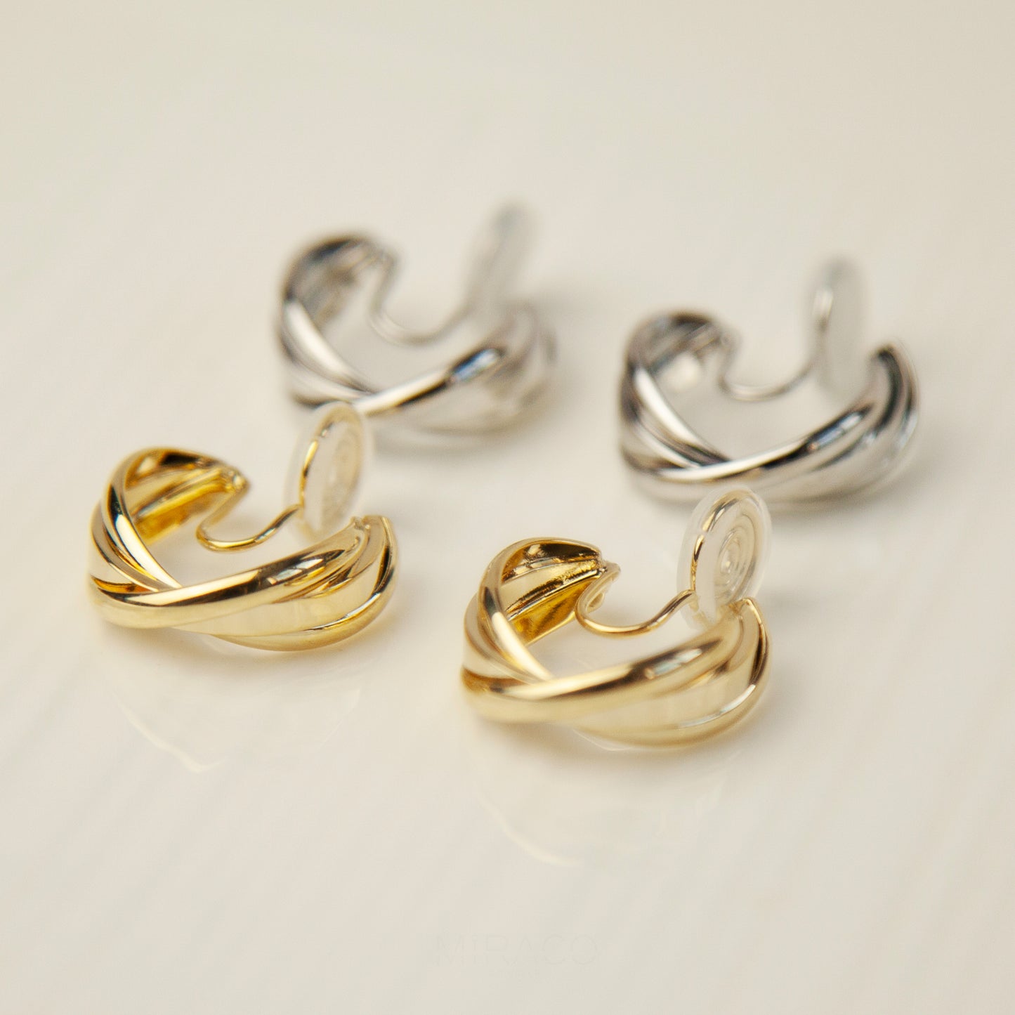 Twisted Hoop Clip On Earrings