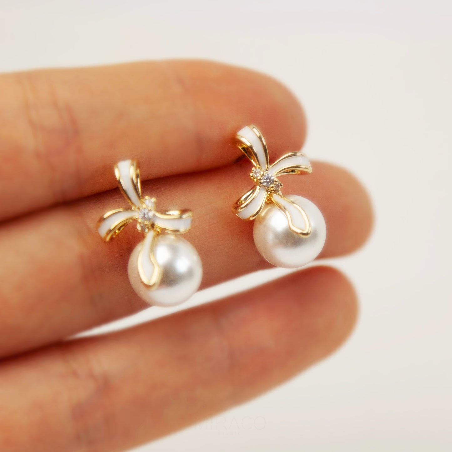 Bow Knot Pearl Clip On Studs