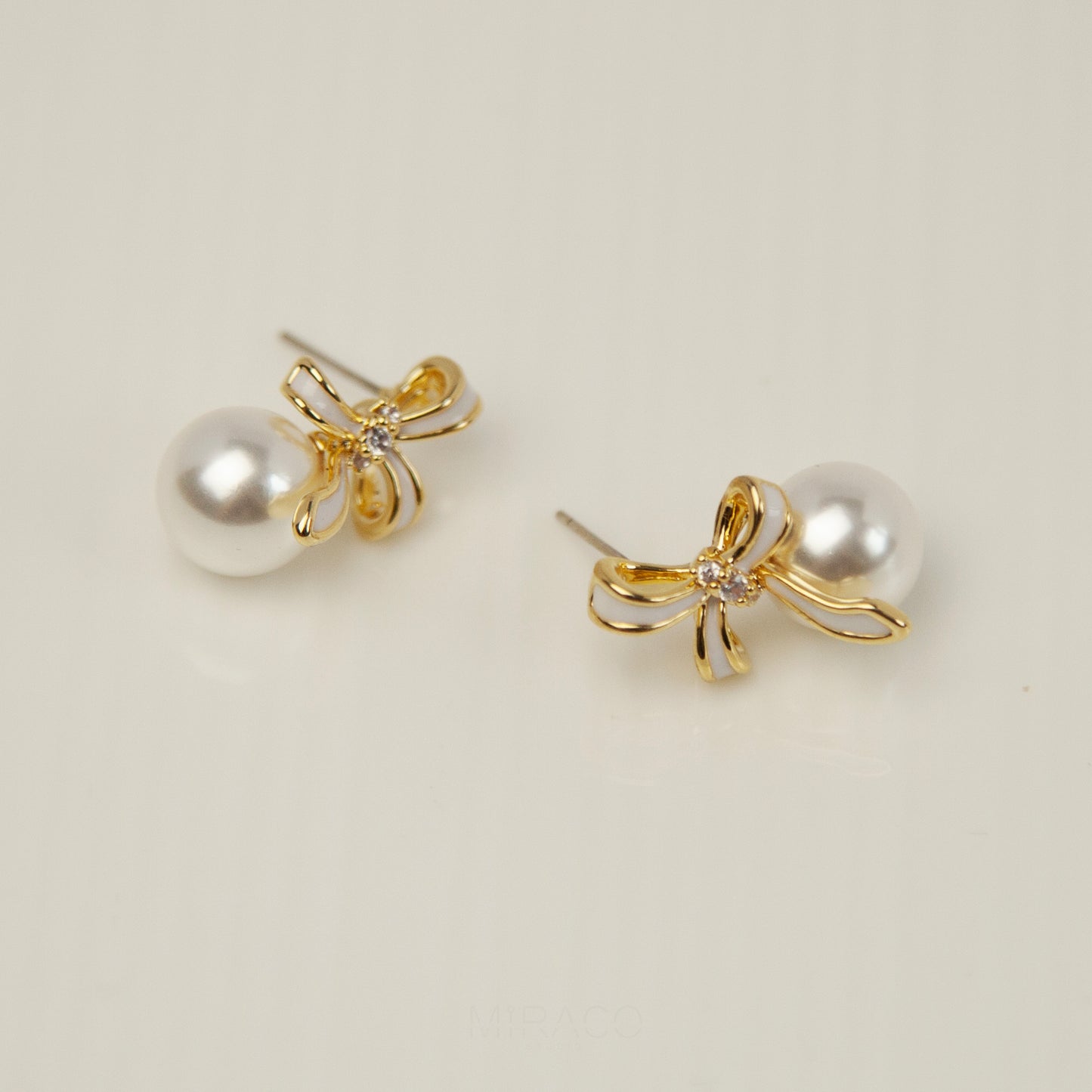 Bow Knot Pearl Clip On Studs