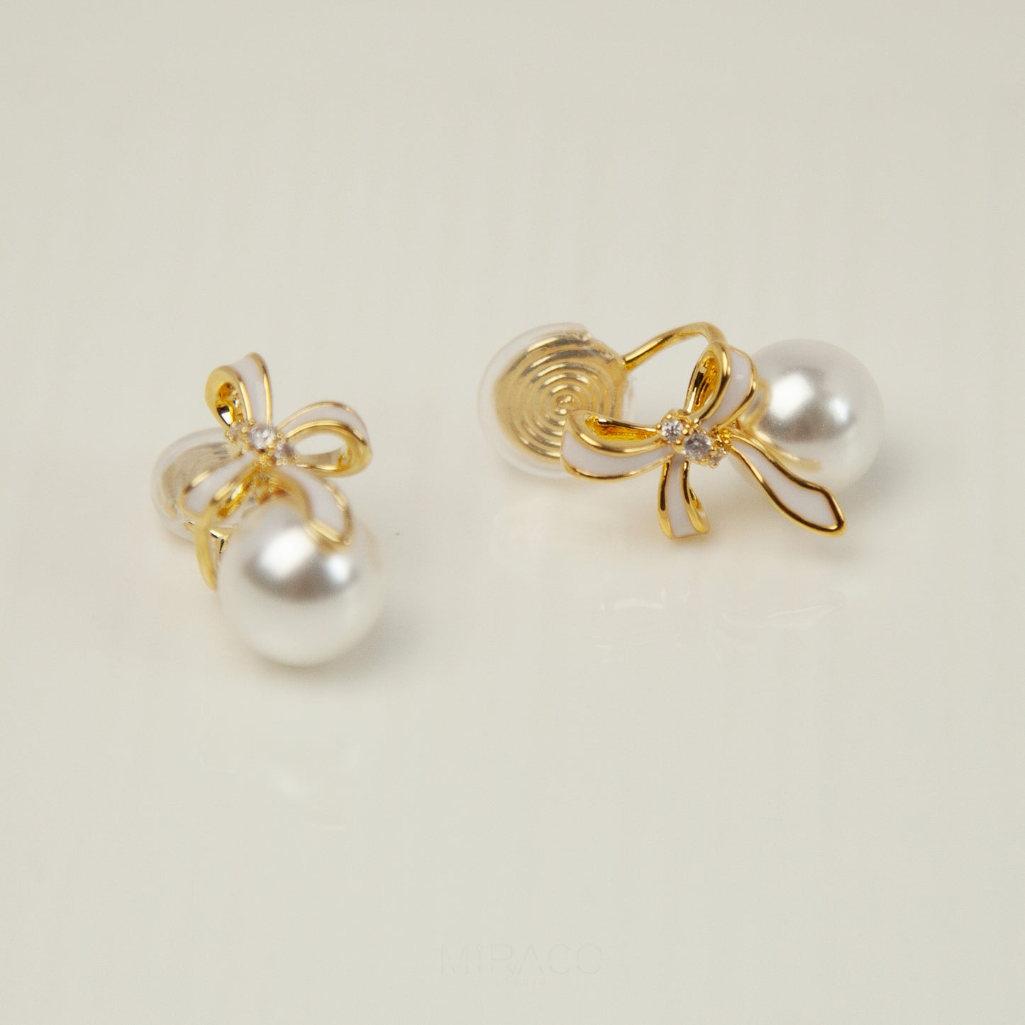 Bow Knot Pearl Clip On Studs