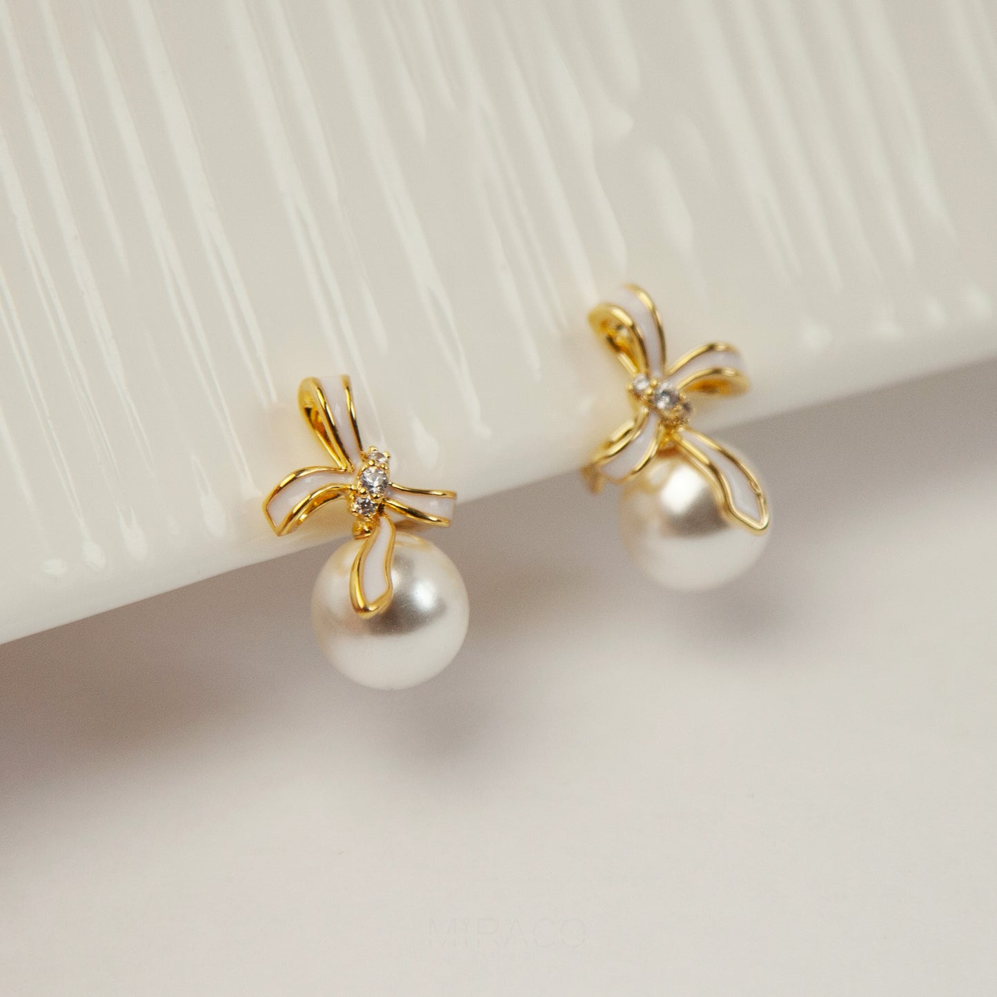 Bow Knot Pearl Clip On Studs