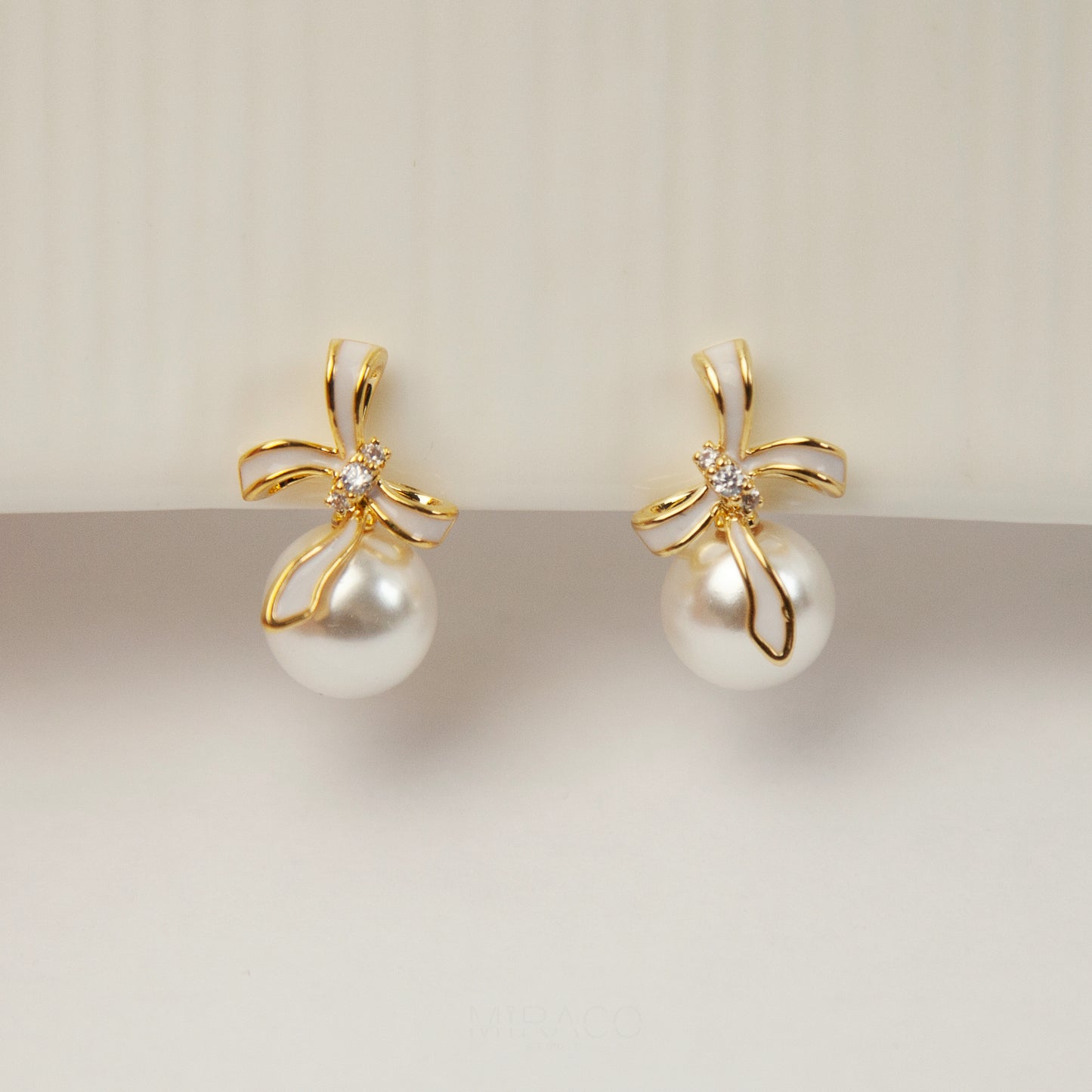 Bow Knot Pearl Clip On Studs