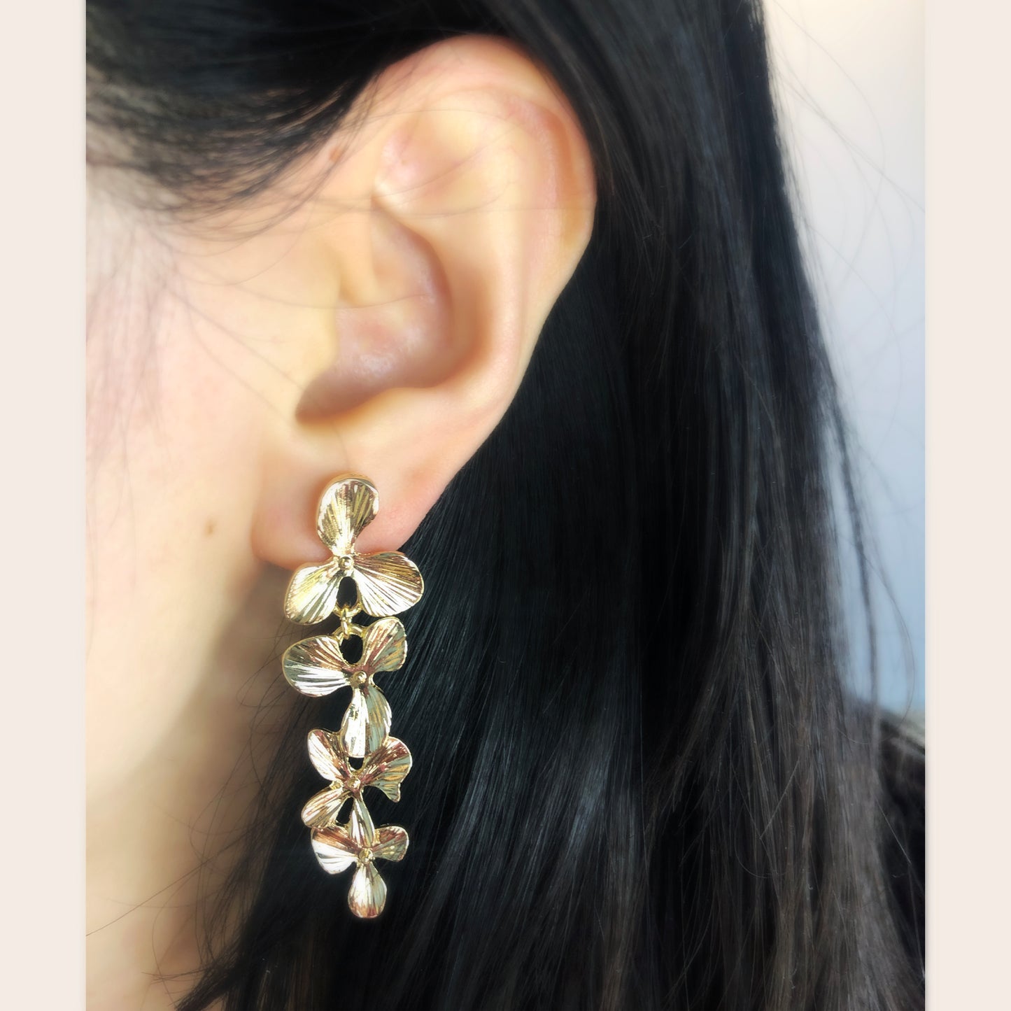 Gold Flower Dangle Clip On Earrings