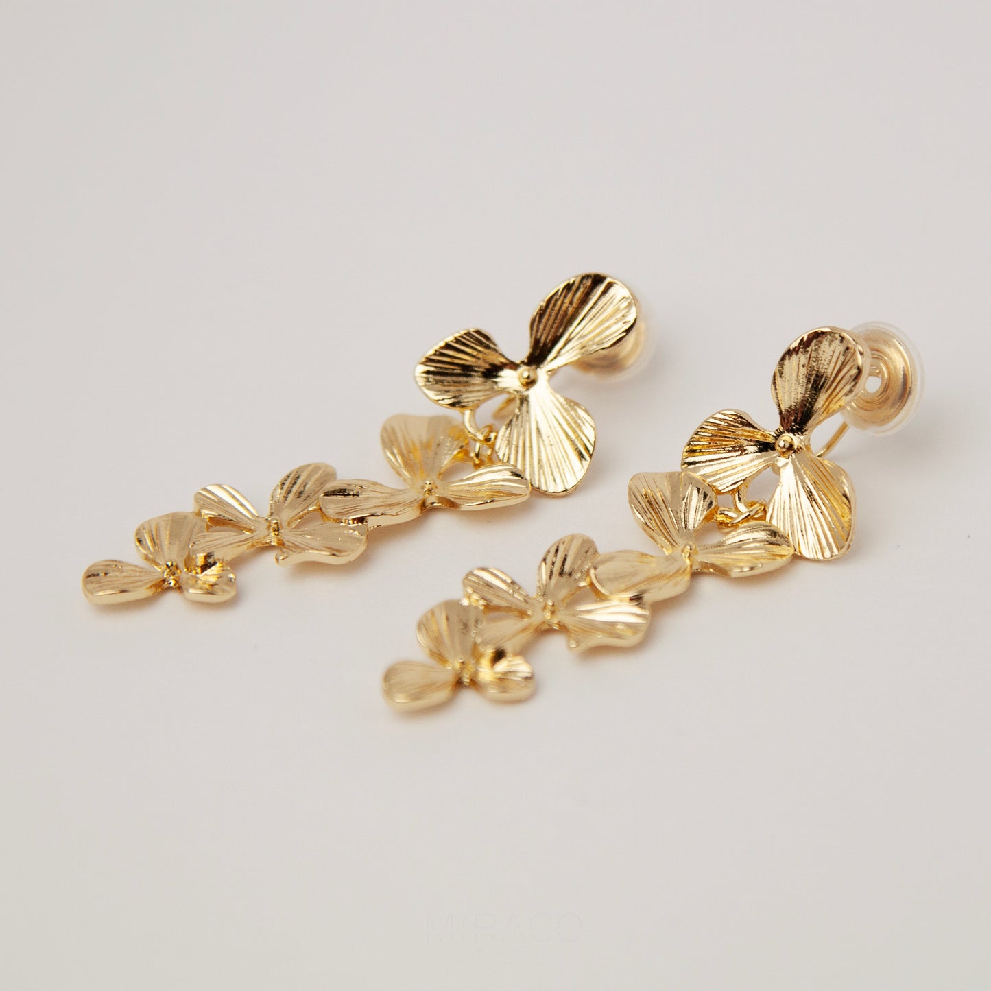 Gold Flower Dangle Clip On Earrings