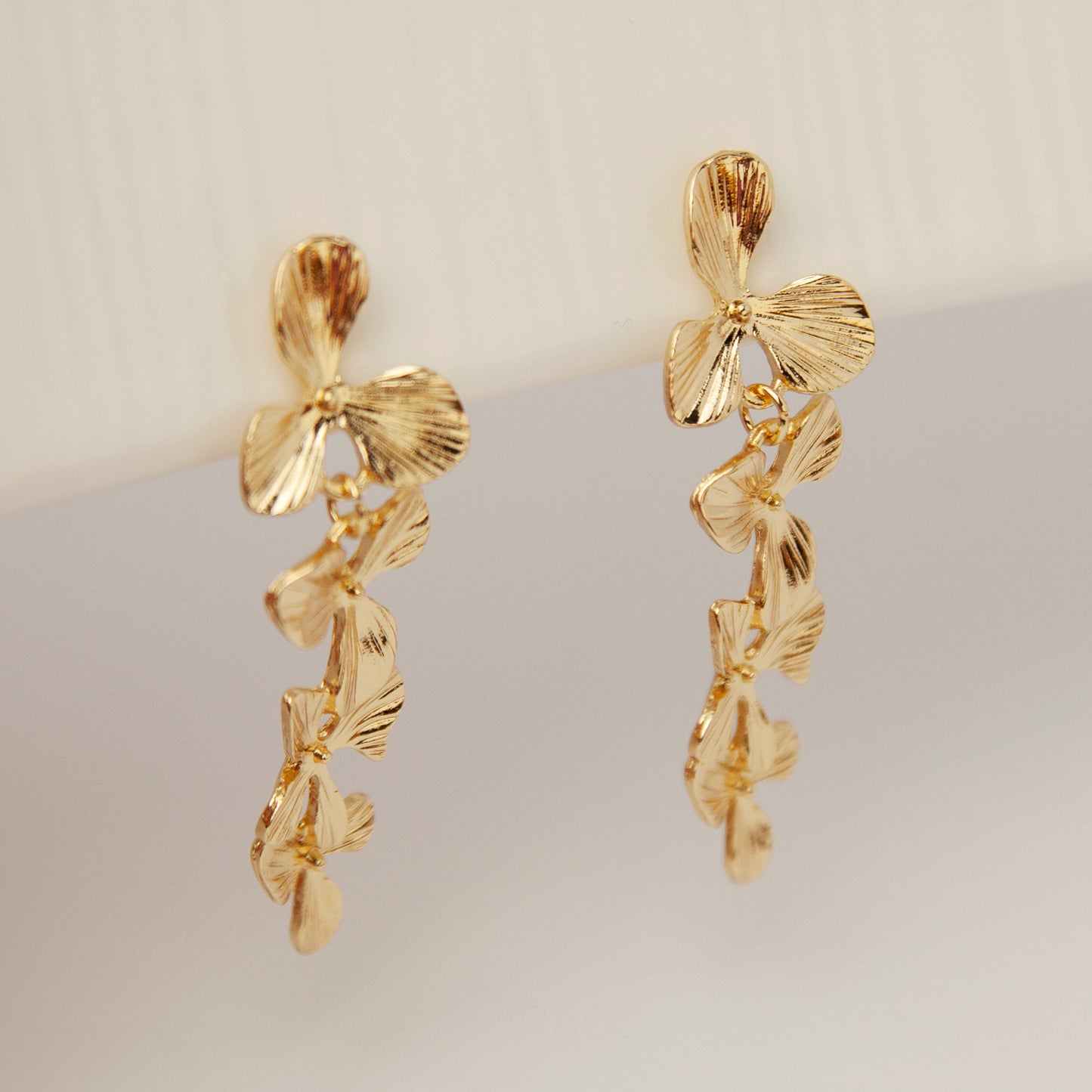 Gold Flower Dangle Clip On Earrings