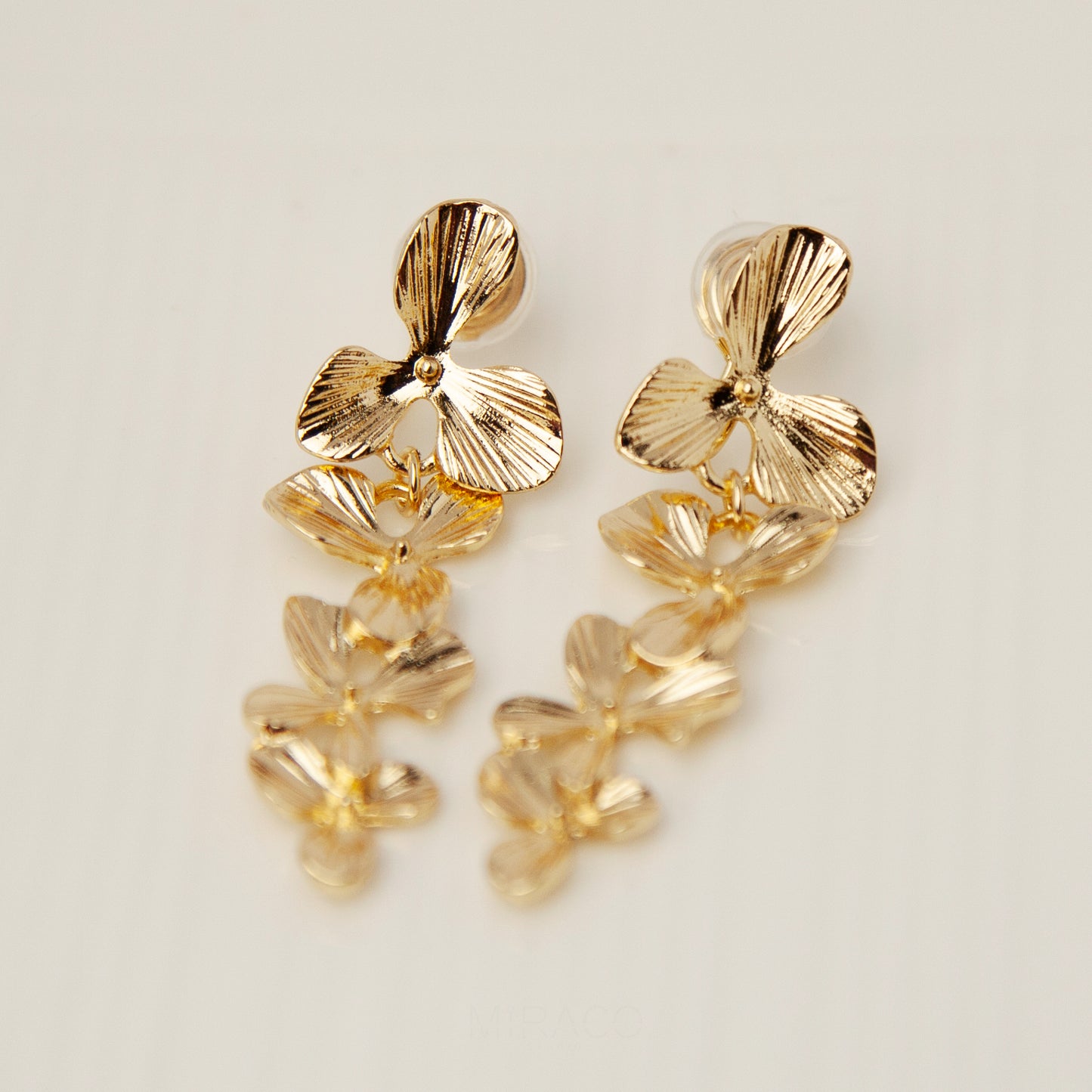 Gold Flower Dangle Clip On Earrings