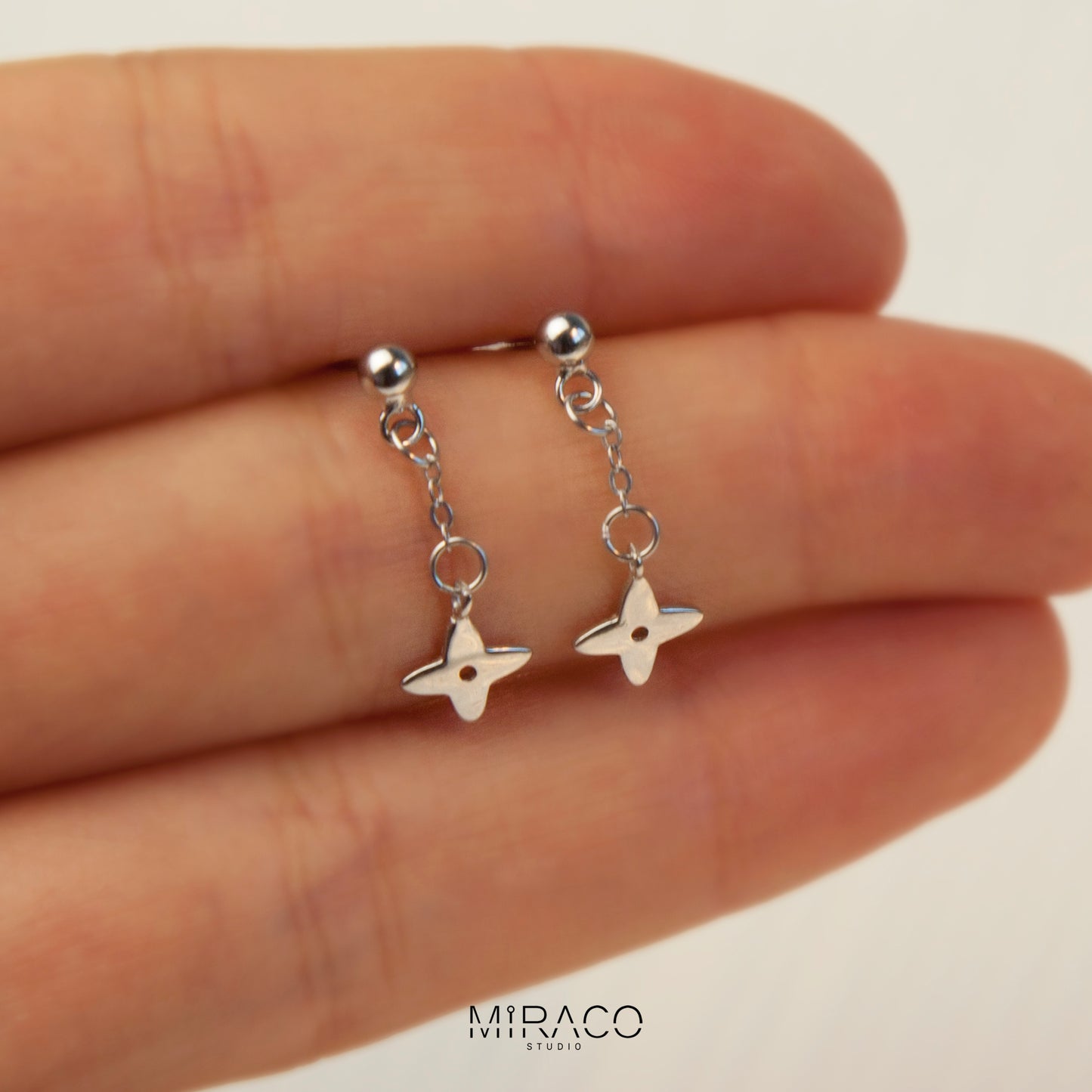 Star Charm Dangle Earrings in Sterling Silver