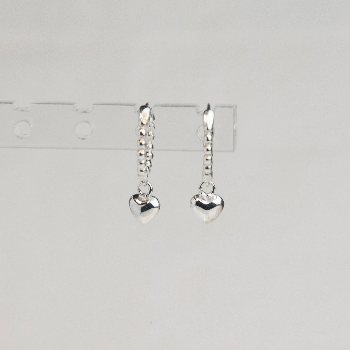 Sterling Silver Dangling Heart Huggie Hoop Earrings