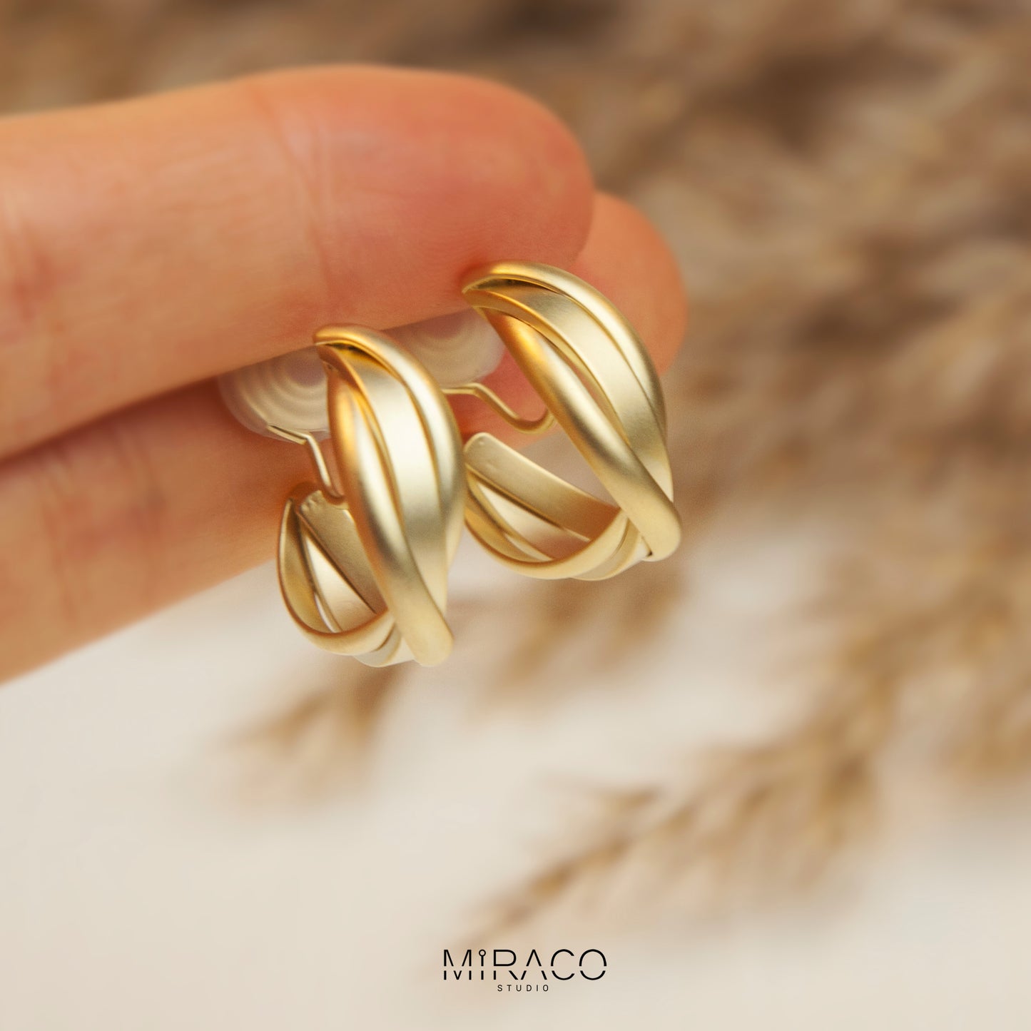 Twisted Matt Gold Hoop Clip On Earrings