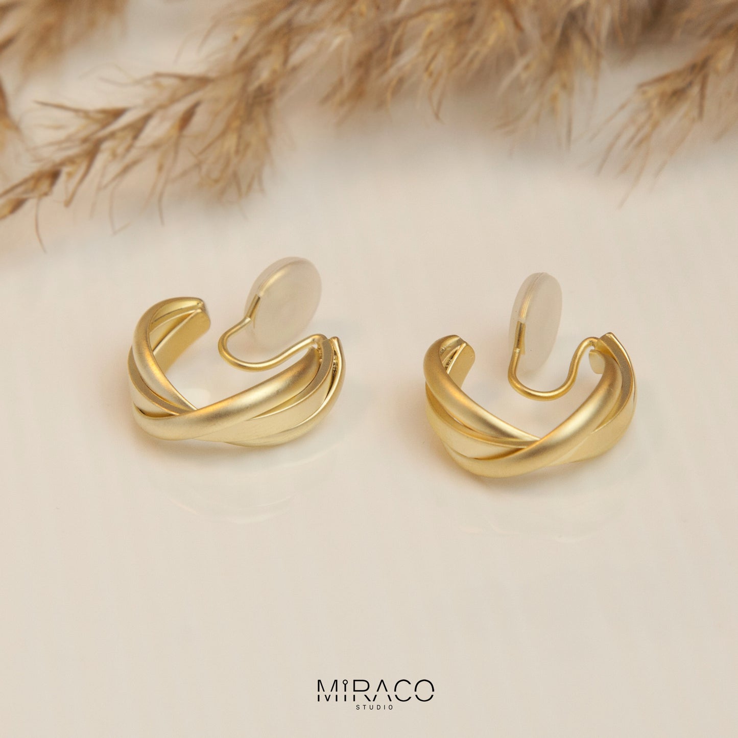 Twisted Matt Gold Hoop Clip On Earrings