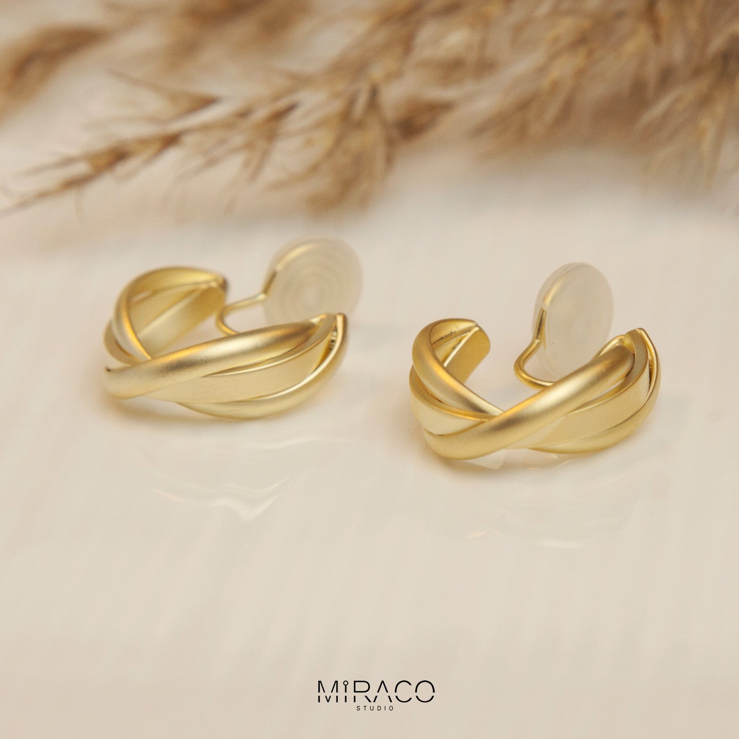 Twisted Matt Gold Hoop Clip On Earrings